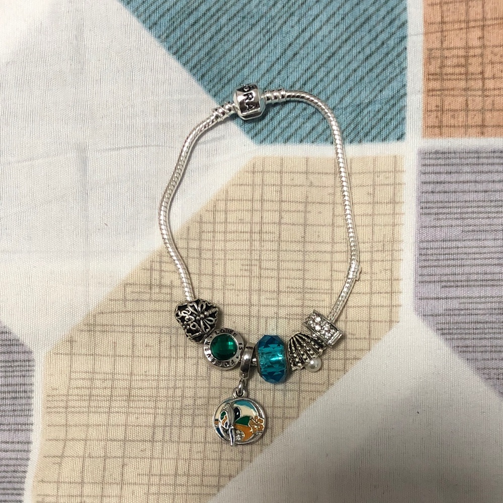 Elegant Silver Bracelet with Green and Blue Charms